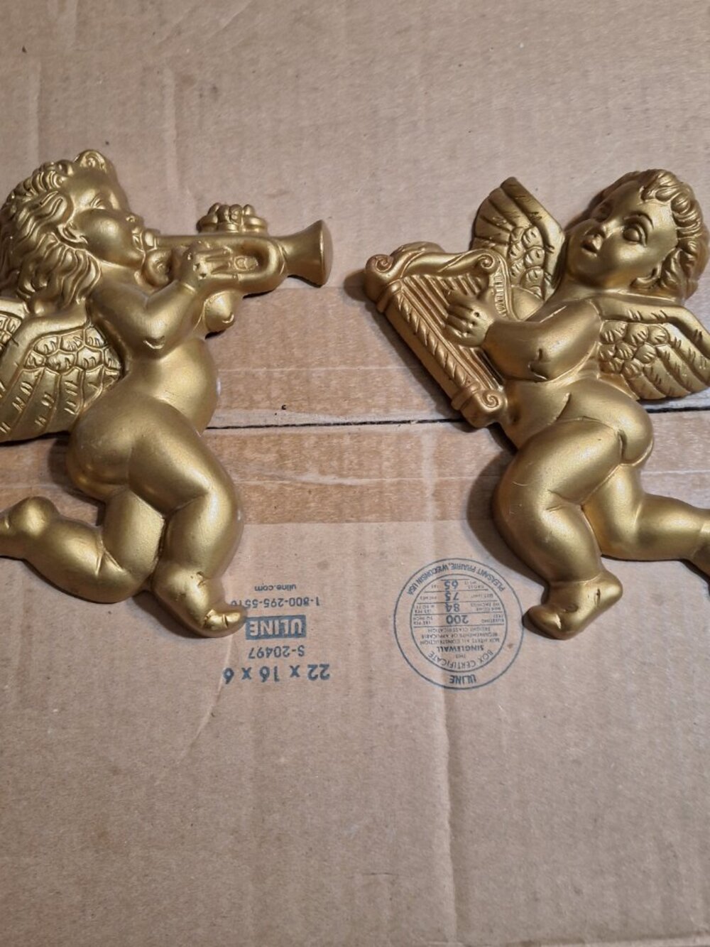 pair of cherub hangings